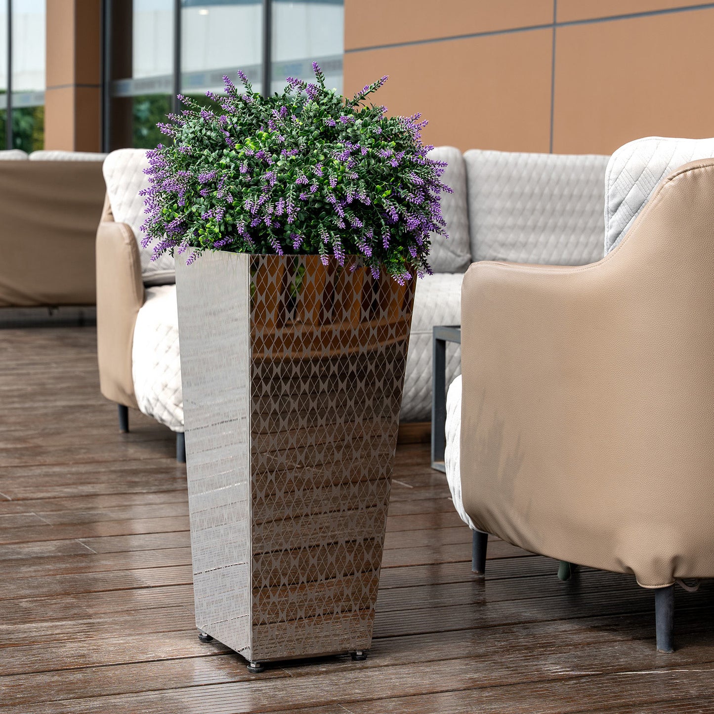 Tall_tapered_mirror_plant_pots_by_Artigwall_around_indoor_lounge_area