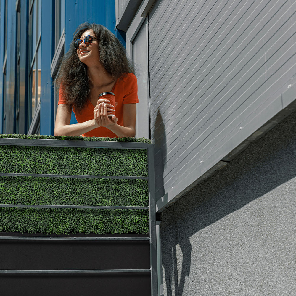 thin_artificial_privacy_hedge_in_black_long_box_planter_for_outdoor_balcony
