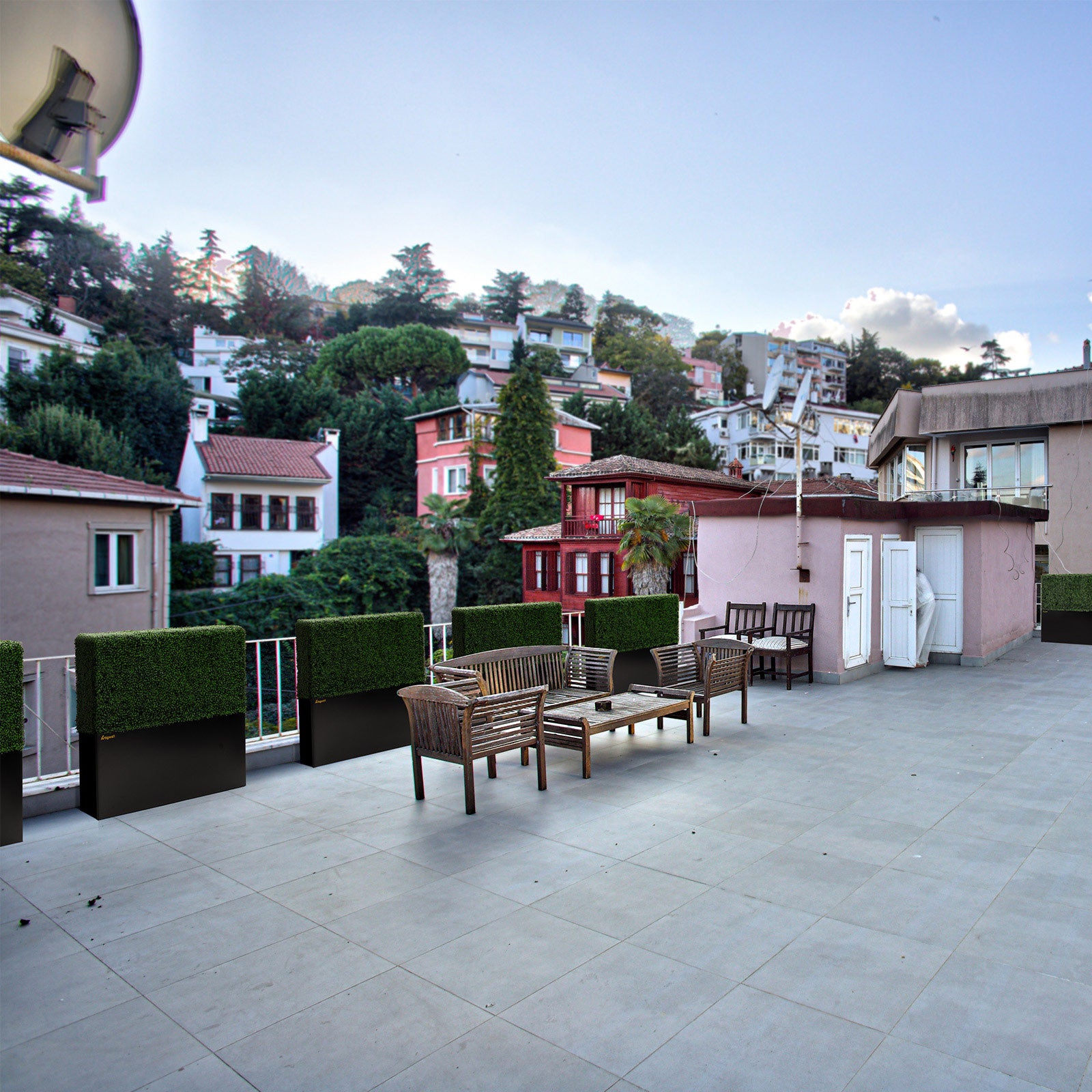 50-inch_faux_boxwood_hedge_wall_next_to_a_patio_railing