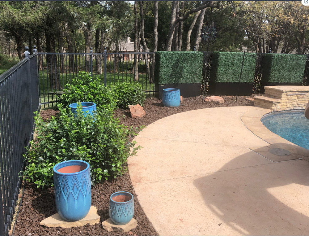 Artigwall® 60 inch Large Boxwood Hedge Wall Generation 4 in flower bed