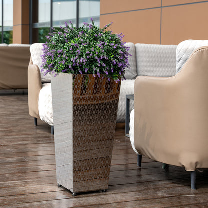 Tall_tapered_mirror_plant_pots_by_Artigwall_around_indoor_lounge_area