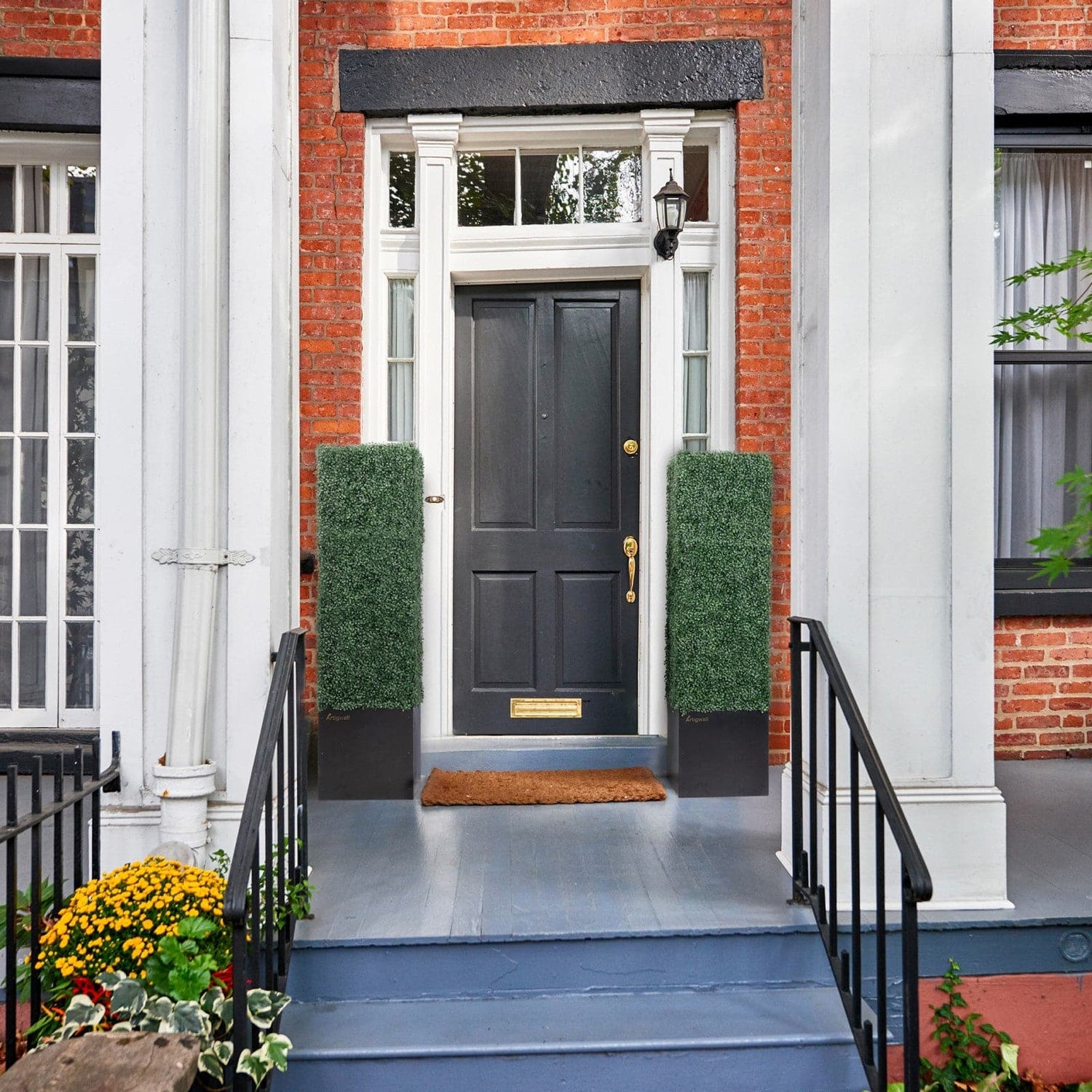 Artigwall boxwood topiary trees on front porch